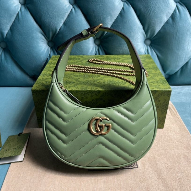 G*u*i top handle bags